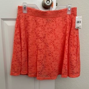 Justify Coral color skirt